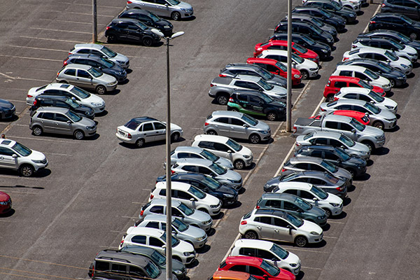 Image showing multiple cars parked in an ANPR parking zone, highlighting the efficient parking system with number plate recognition technology.