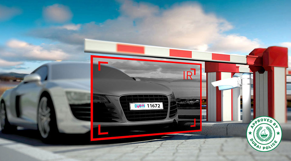 anpr camera scanning vehicle license plate as boom barrier opens for car entry in automated access system