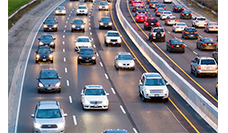 multiple cars passing on the highway, monitored by anpr system for vehicle tracking and traffic management