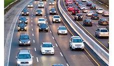 multiple cars passing on the highway, monitored by anpr system for vehicle tracking and traffic management