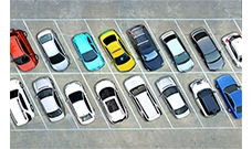 top view of multiple cars parked in a zone, monitored by anpr system for efficient parking management
