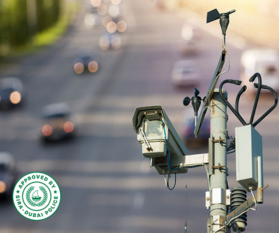 titanhz camera on a pole focused on monitoring traffic vehicles with a blurred city background for enhanced surveillance.