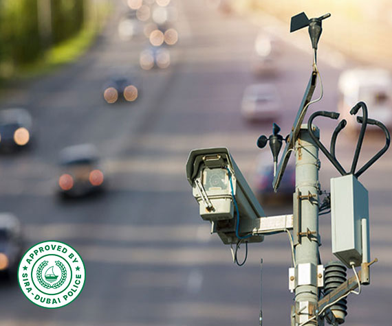 titanhz camera on a pole focused on monitoring traffic vehicles with a blurred city background for enhanced surveillance.